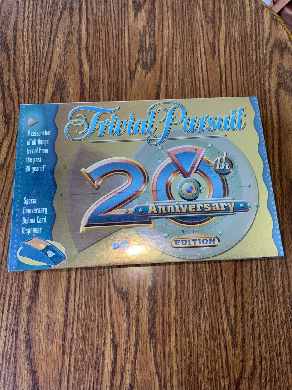 Trivial pursuit 20th anniversary edition with deluxe card dispenser sealed 2002